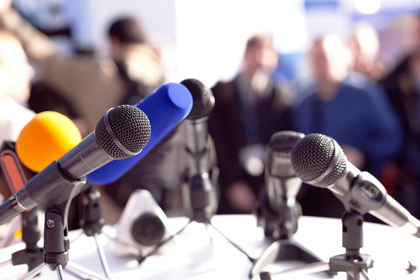 microphones at a press conference