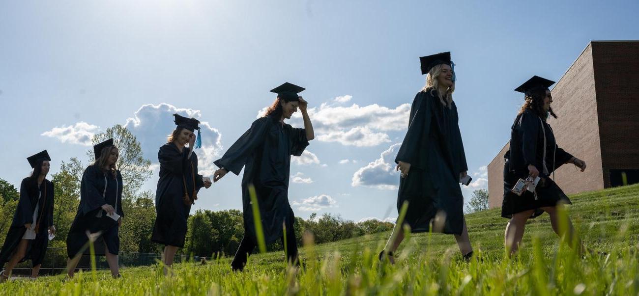 Graduates in cap and gowns