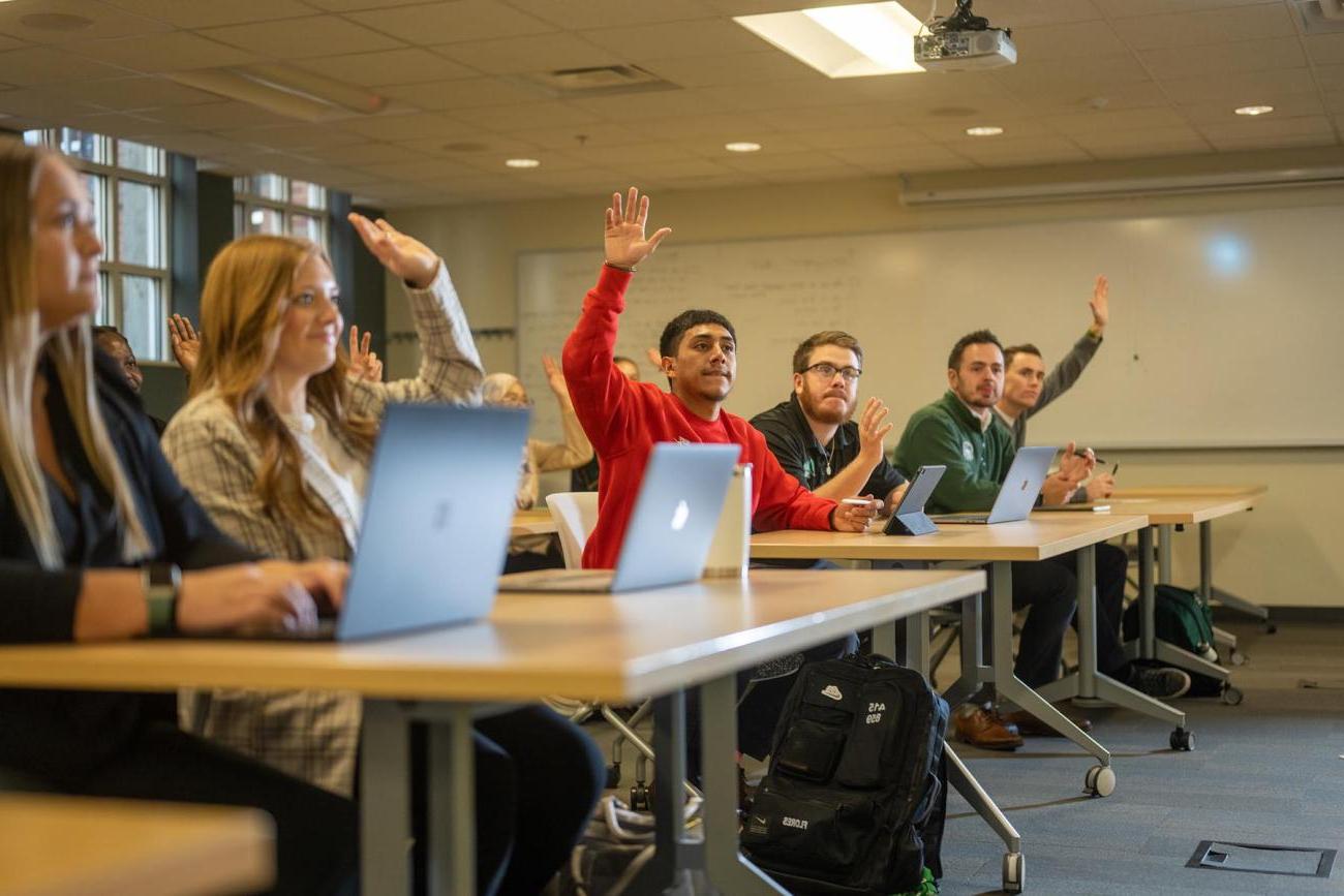 Students Raising Hands